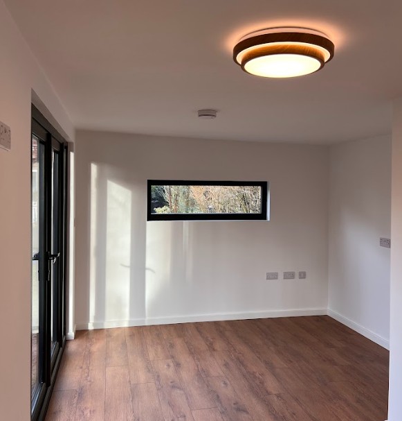 garden room office and accommodation roe green internal view