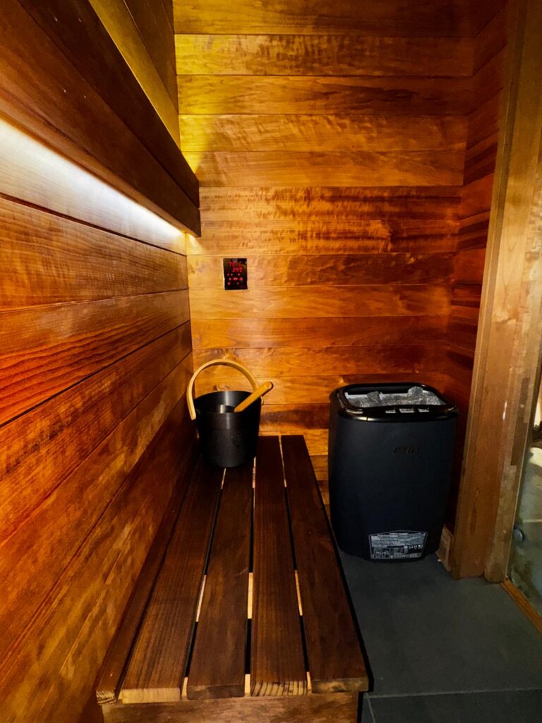 inside outdoor sauna room bench