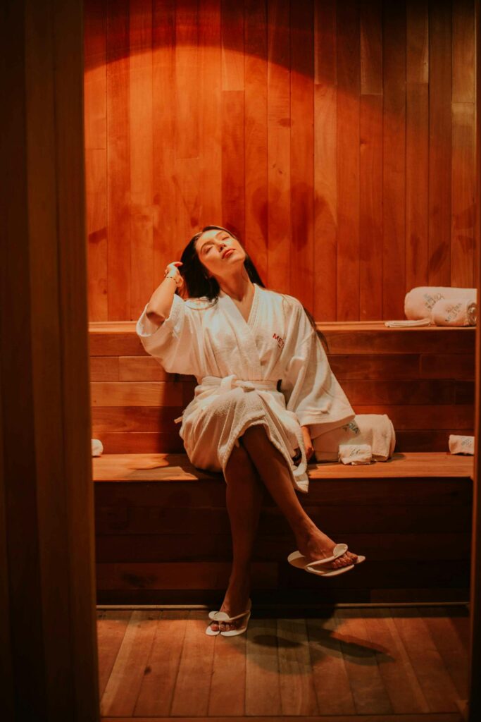 benefits of woman in outdoor sauna pod