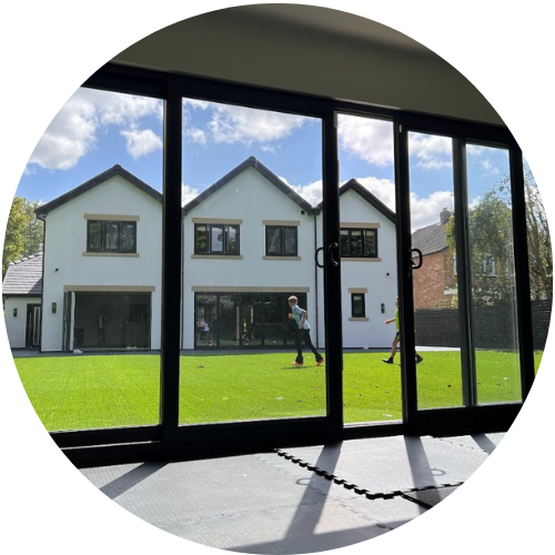large garden room in cheshire with home in background