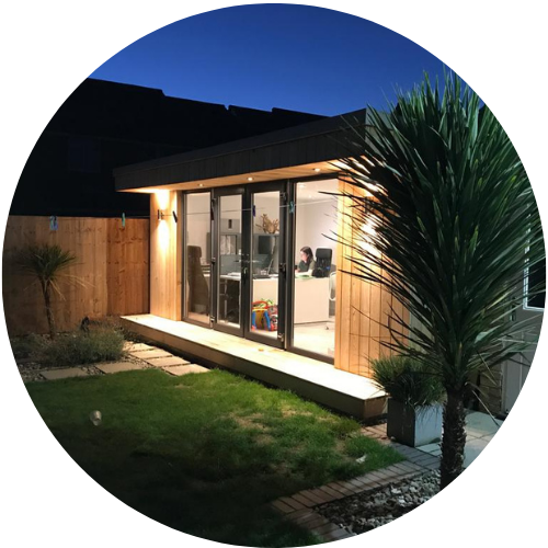 garden room office in cheshire at night