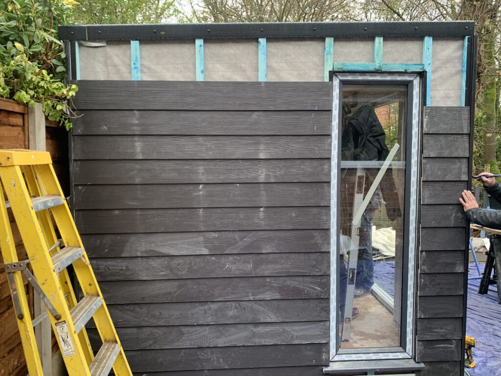 midnight black cladding going on the garden office worsley mulgrave road