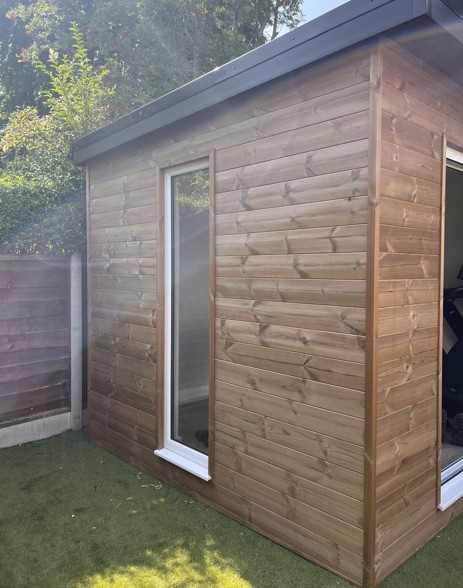 side profile of small gym garden room