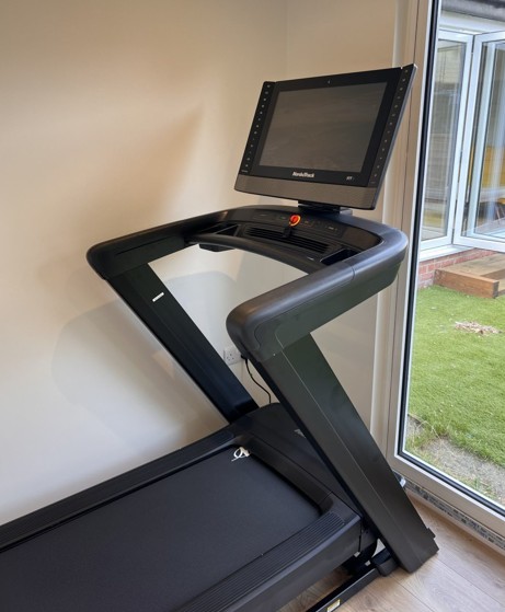 tredmill inside garden gym room