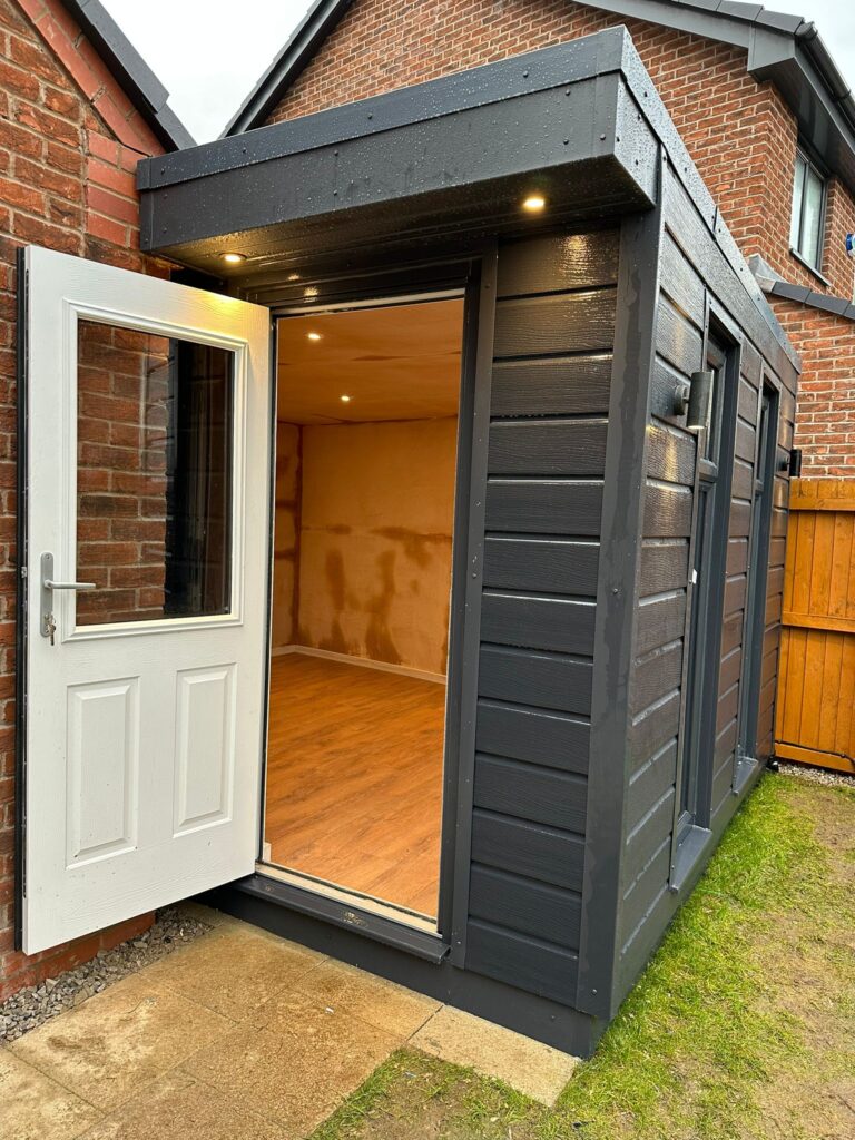 garden room in manchester with composite door open