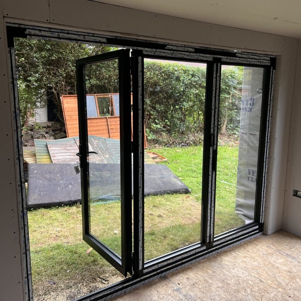 internal view of the home office looking out of the bifold doors